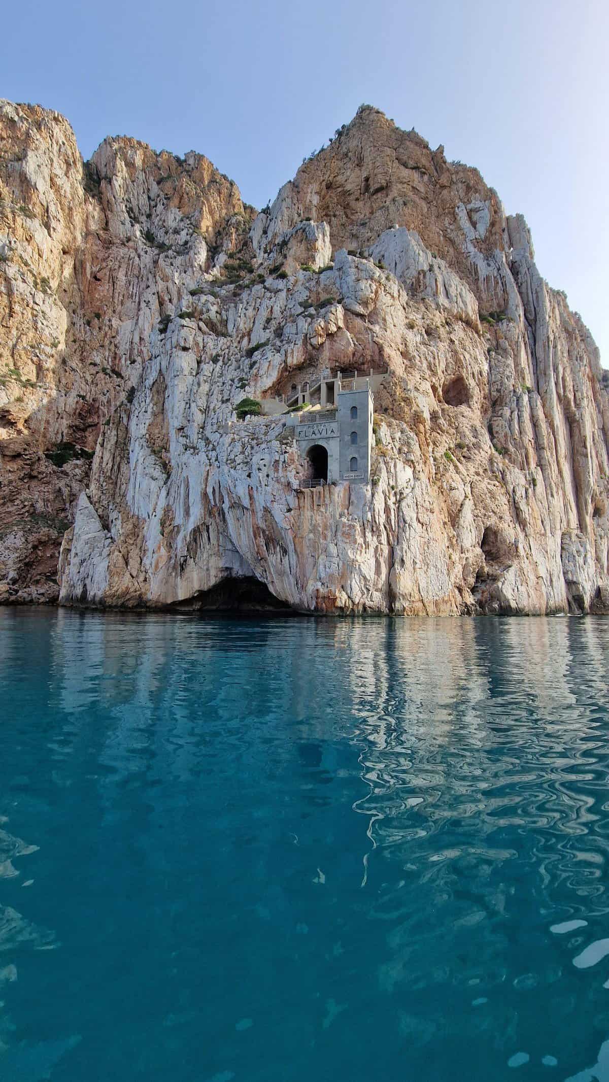 Visita Miniera Porto Flavia Sardegna: come arrivare? Visita in barca o all'interno? 15 Visita Miniera Porto Flavia Sardegna come arrivare Visita in barca o allinterno tripilare 4